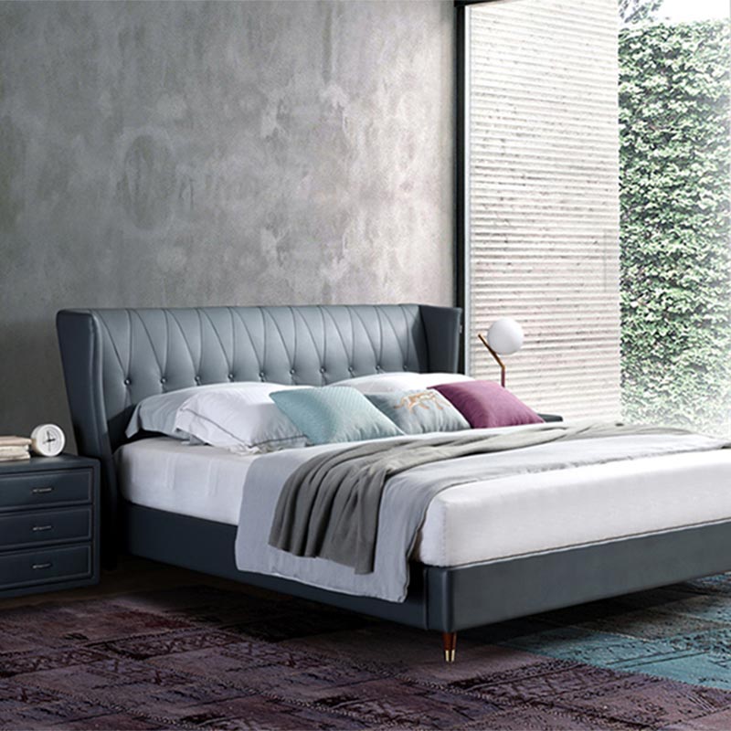 Łóżko z litego drewna, owinięte w całości skórą